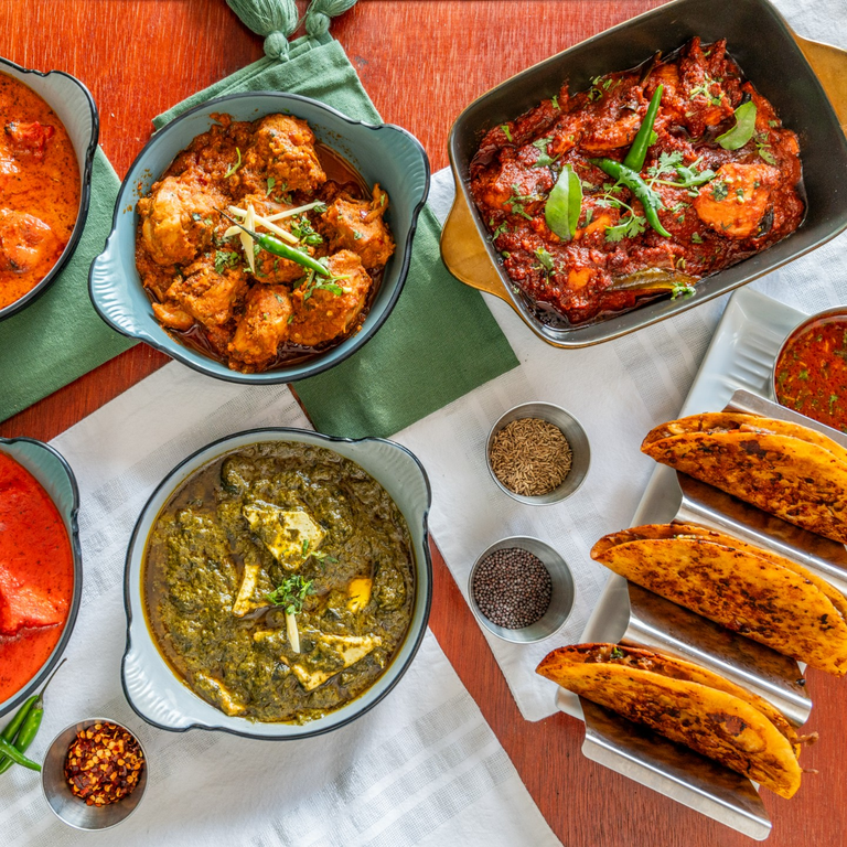 What kind of food can I expect at Suma's Kitchen?
